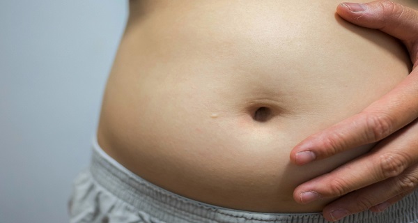 symptoms of bloated belly